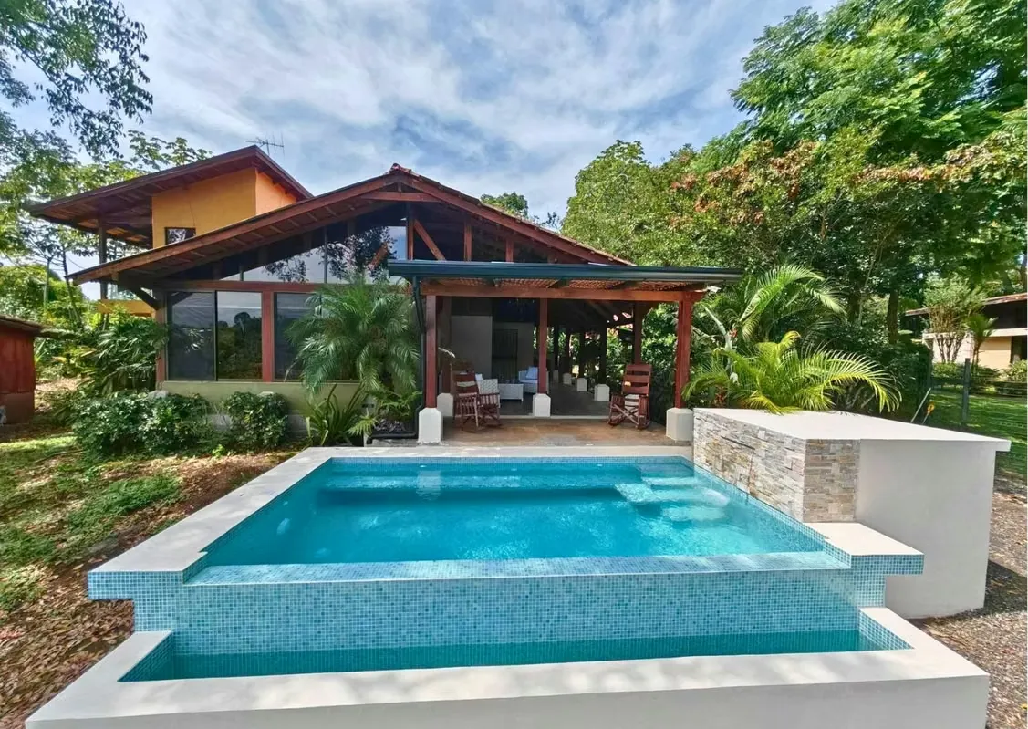 Located in the quiet town of Mercedes de Atenas, this farmhouse-style home offers a cozy natural setting, privacy, and beautiful views. ...